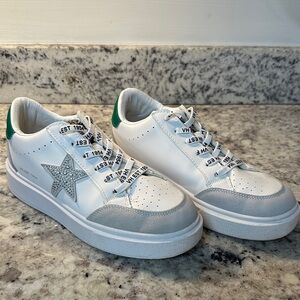 Vintage Havana platform sneakers with green accents.